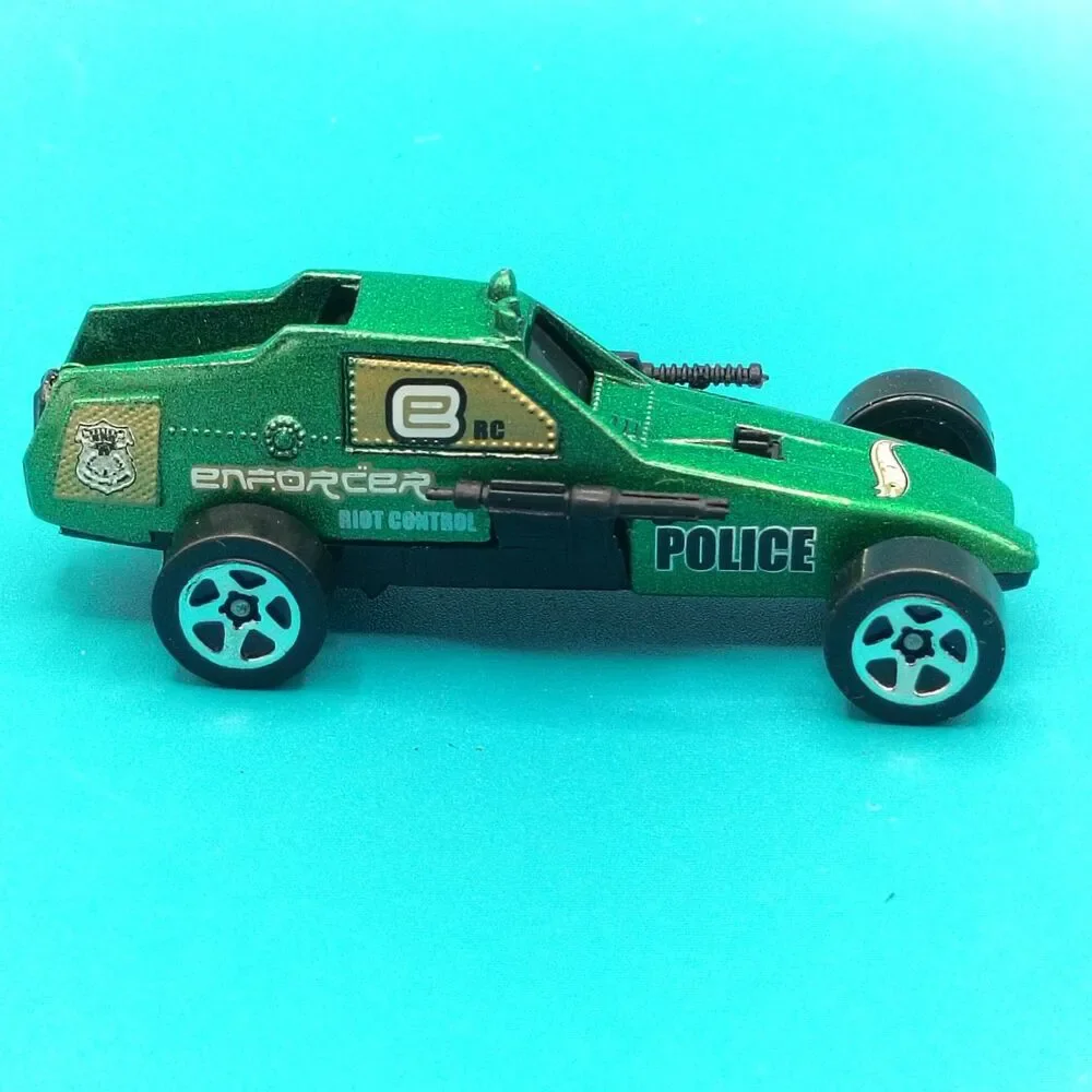 Hot Wheels Enforcer Riot Control Police Car Green Diecast Vehicle Mattel